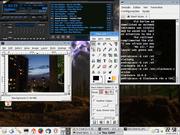 KDE Slackware 10.0 rodando XMMS, Konsole, Skype e Gimp